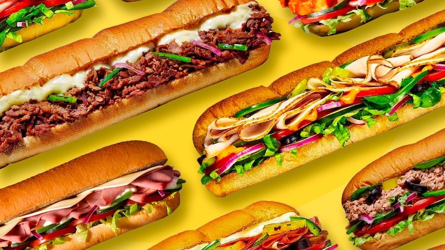 Image thumbnail for What happened to Subway? Many subs of different variety against a yellow background